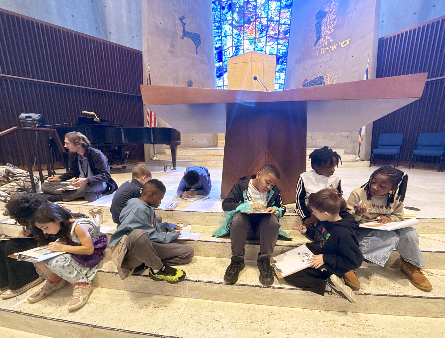 Kids making art in the scantuary 